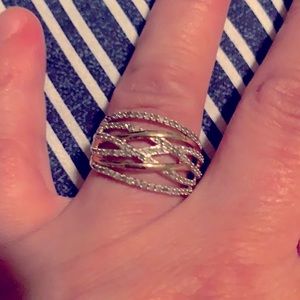 Really pretty diamond ring not sure on what kind of metal sorry